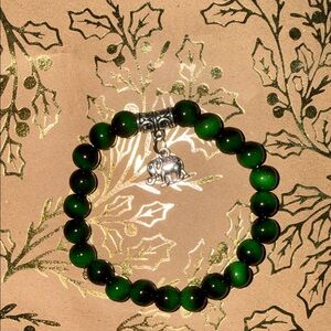 Green Beaded Bracelet with Elephant Charm